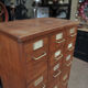 Office furniture has oak drawers 1950 brass handles and label holders