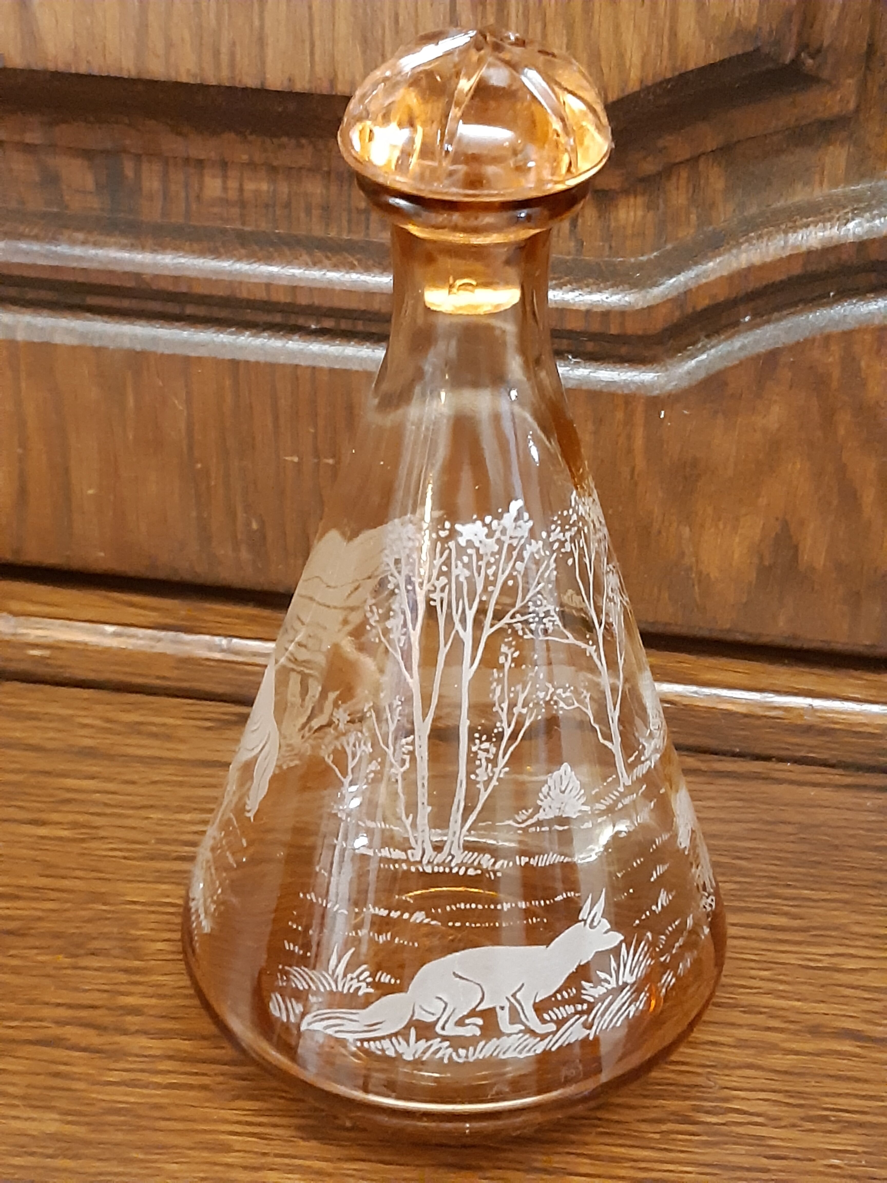 Moulded blown glass decanter with equestrian fox hunting décor, belle époque