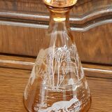 Moulded blown glass decanter with equestrian fox hunting décor, belle époque