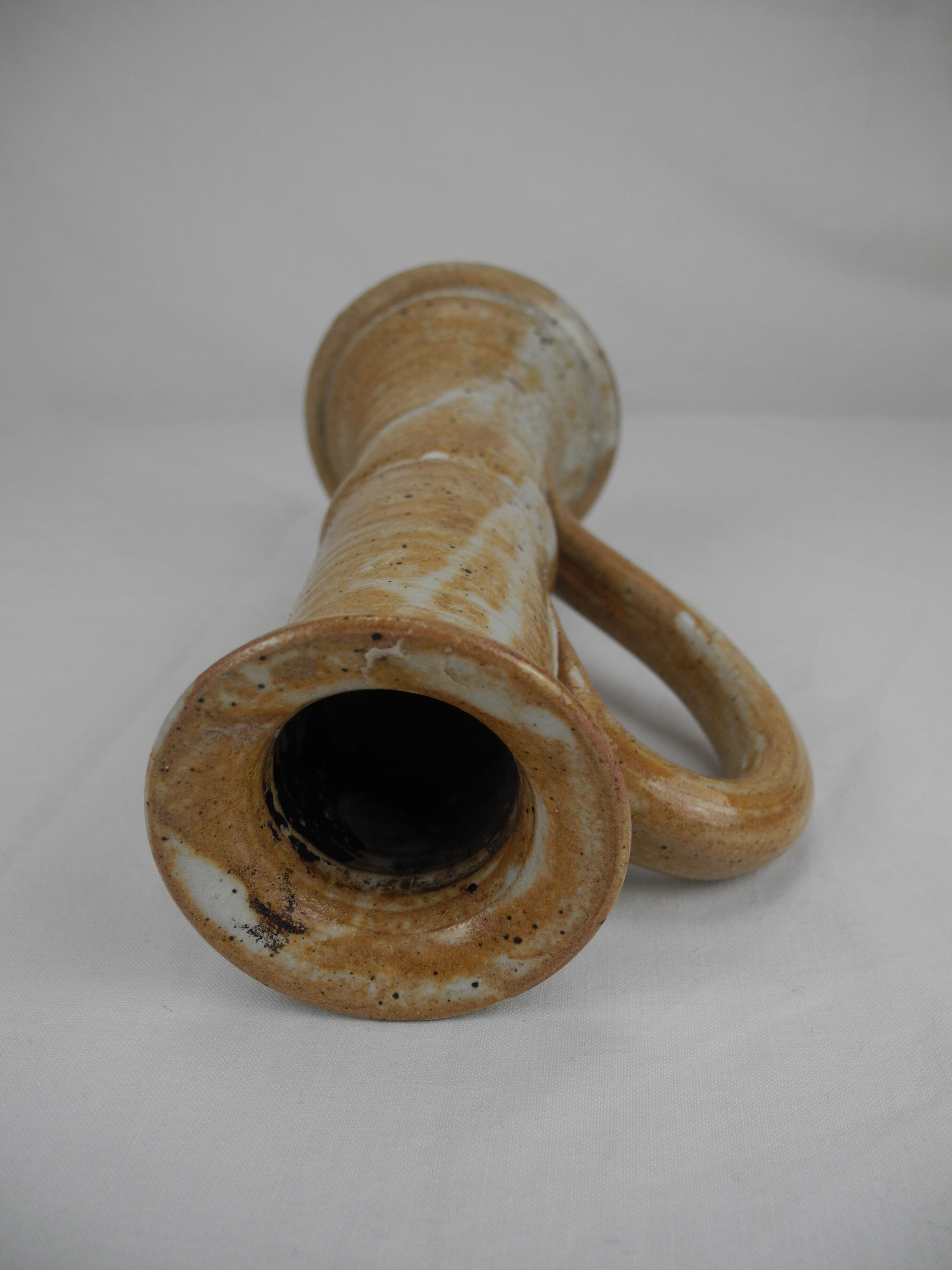 Old vintage stoneware candle holder