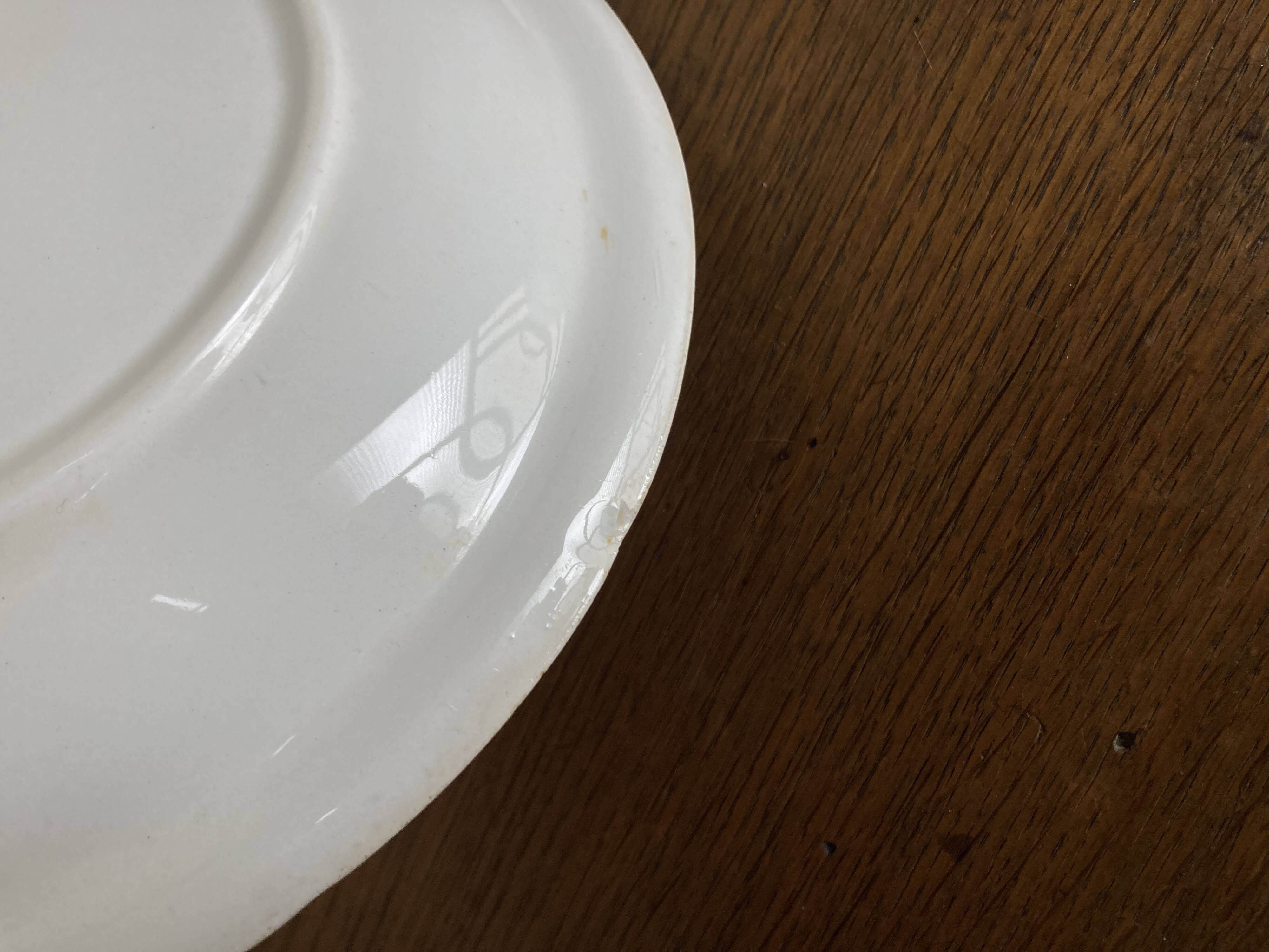 Set of 7 modernist flat plates Lunéville 1930 white earthenware