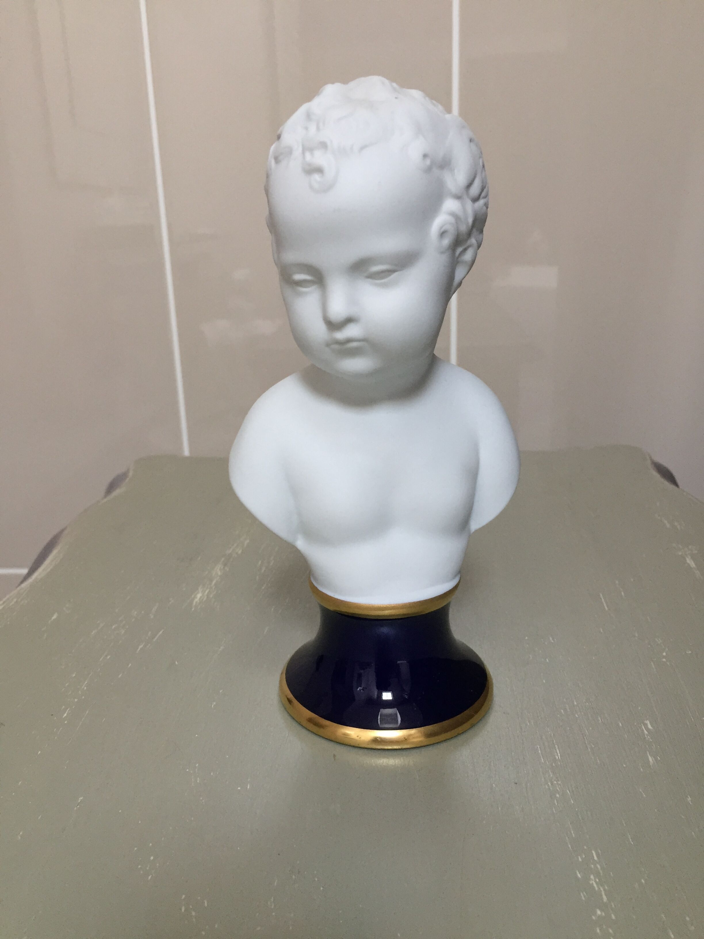 Child bust in limoges porcelain