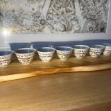 Set of gold patterned cups