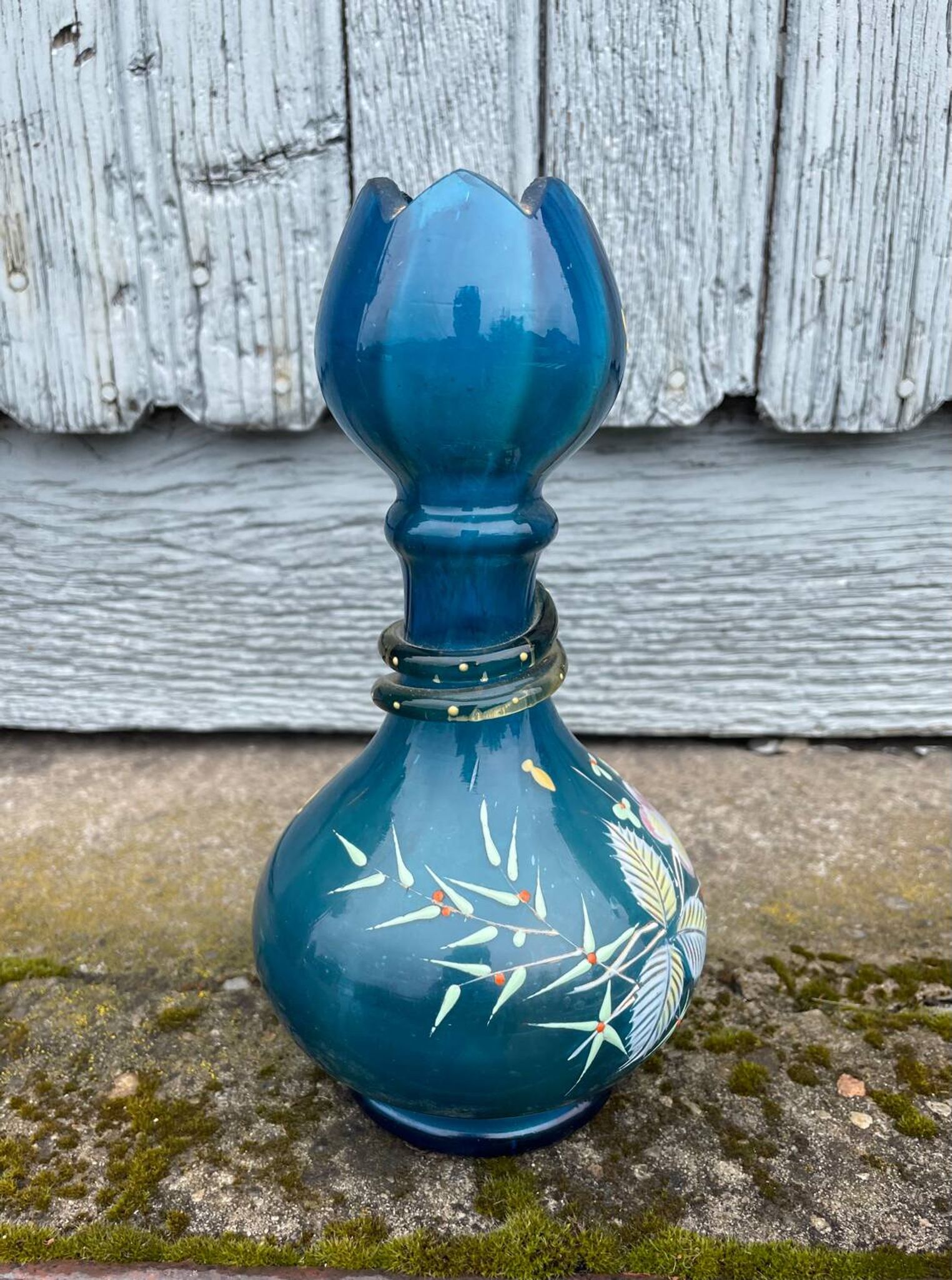 vintage vase painted in satin blue