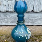 vintage vase painted in satin blue