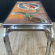Vintage coffee table in stainless steel and ceramic from the 1970s.