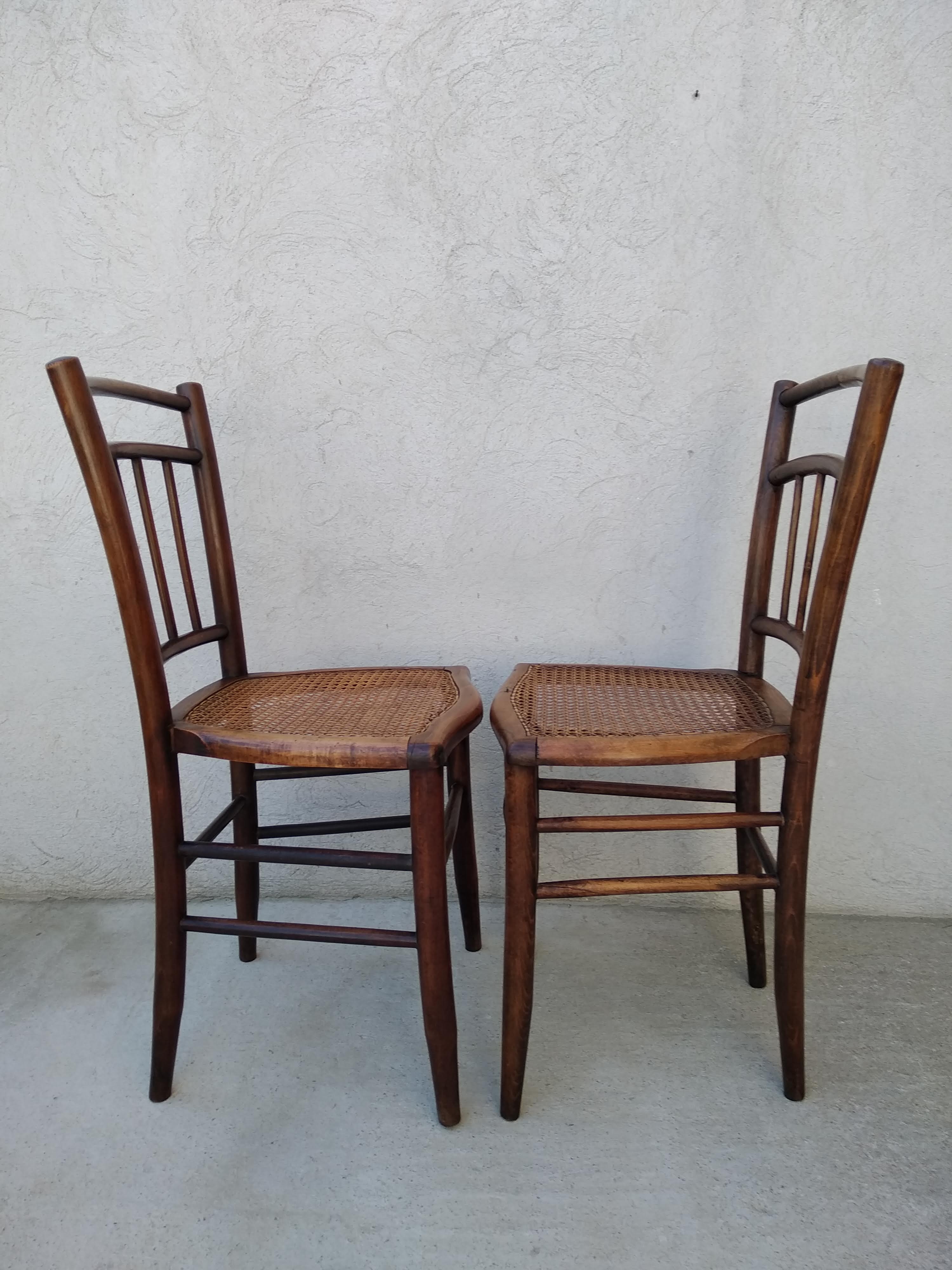 Set of 4 antique bistro chairs canned seats