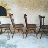 Eight mismatched bistro chairs