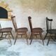 Eight mismatched bistro chairs