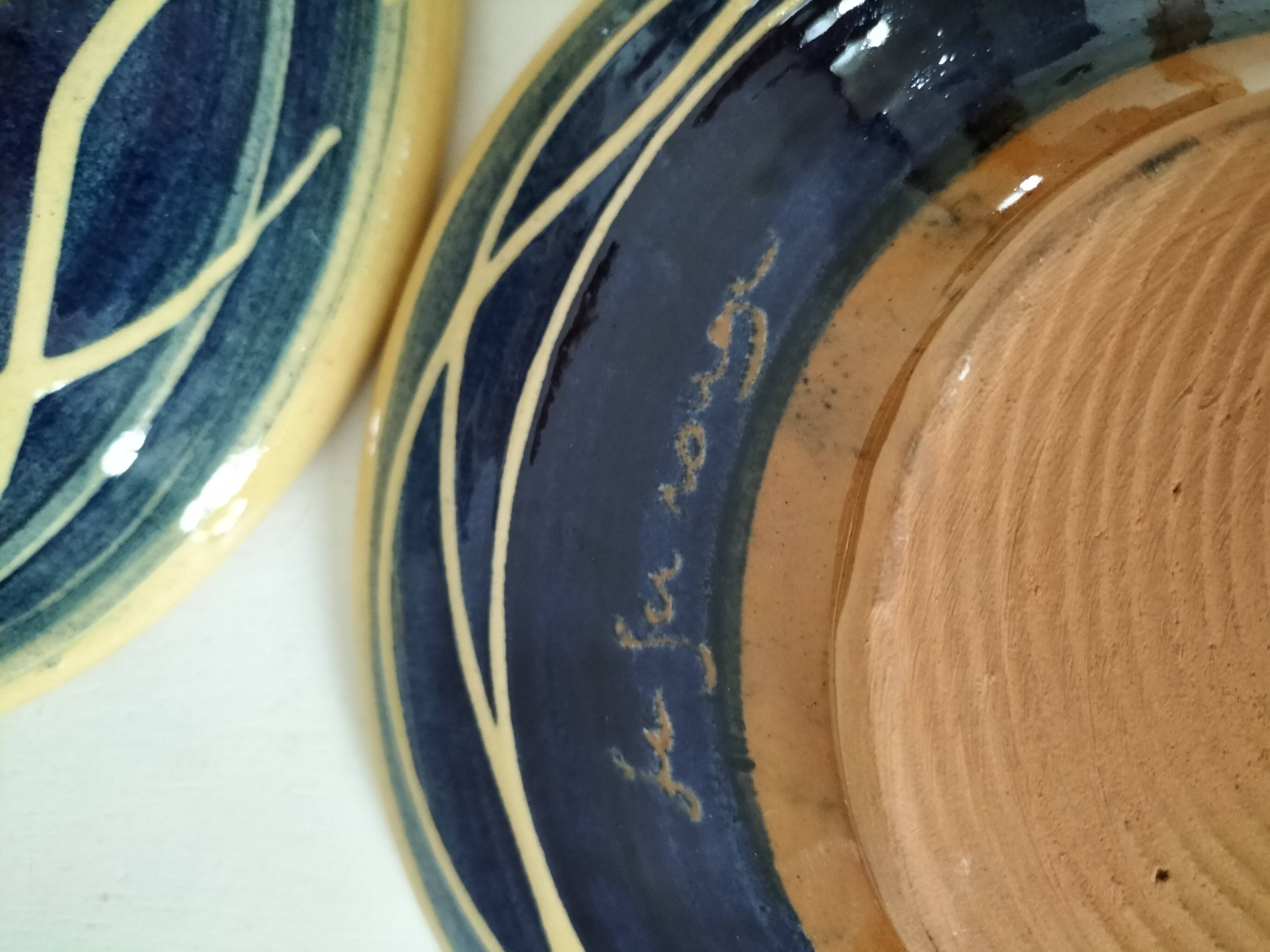Pair of handcrafted bowls by Le Fer Rouge with blue and beige decor