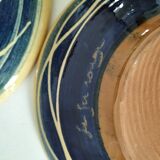 Pair of handcrafted bowls by Le Fer Rouge with blue and beige decor