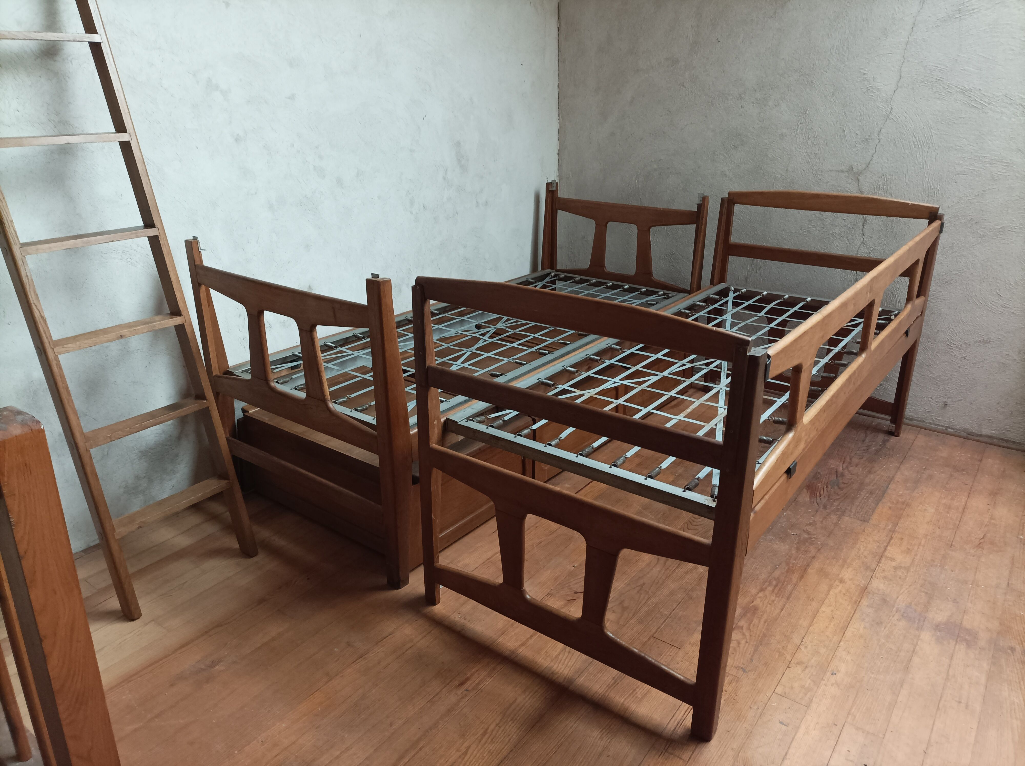 Stackable twin beds with storage chests