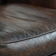 Characterful sheep leather armchair with a beautiful deep colour