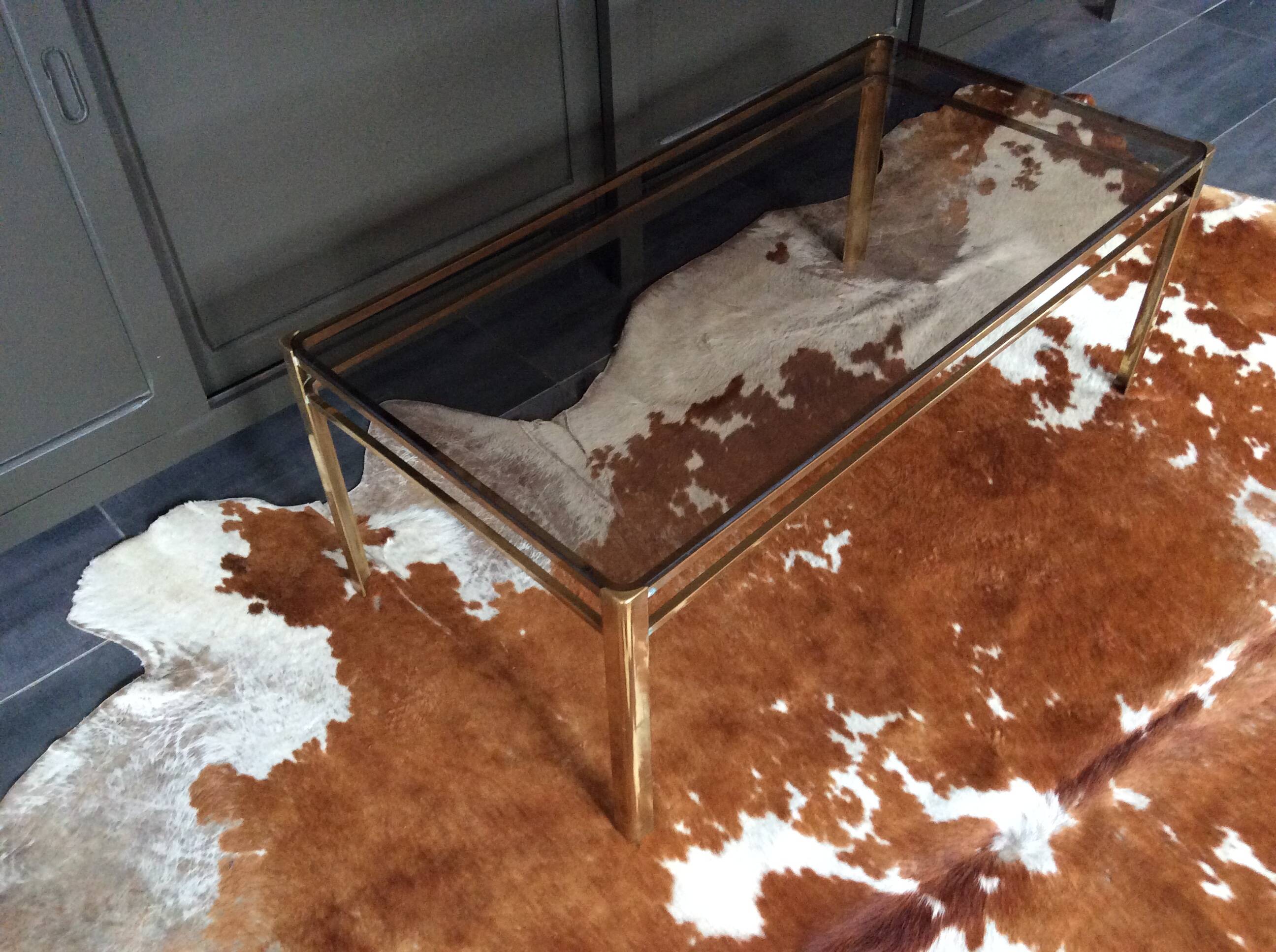 Glass and brass coffee table