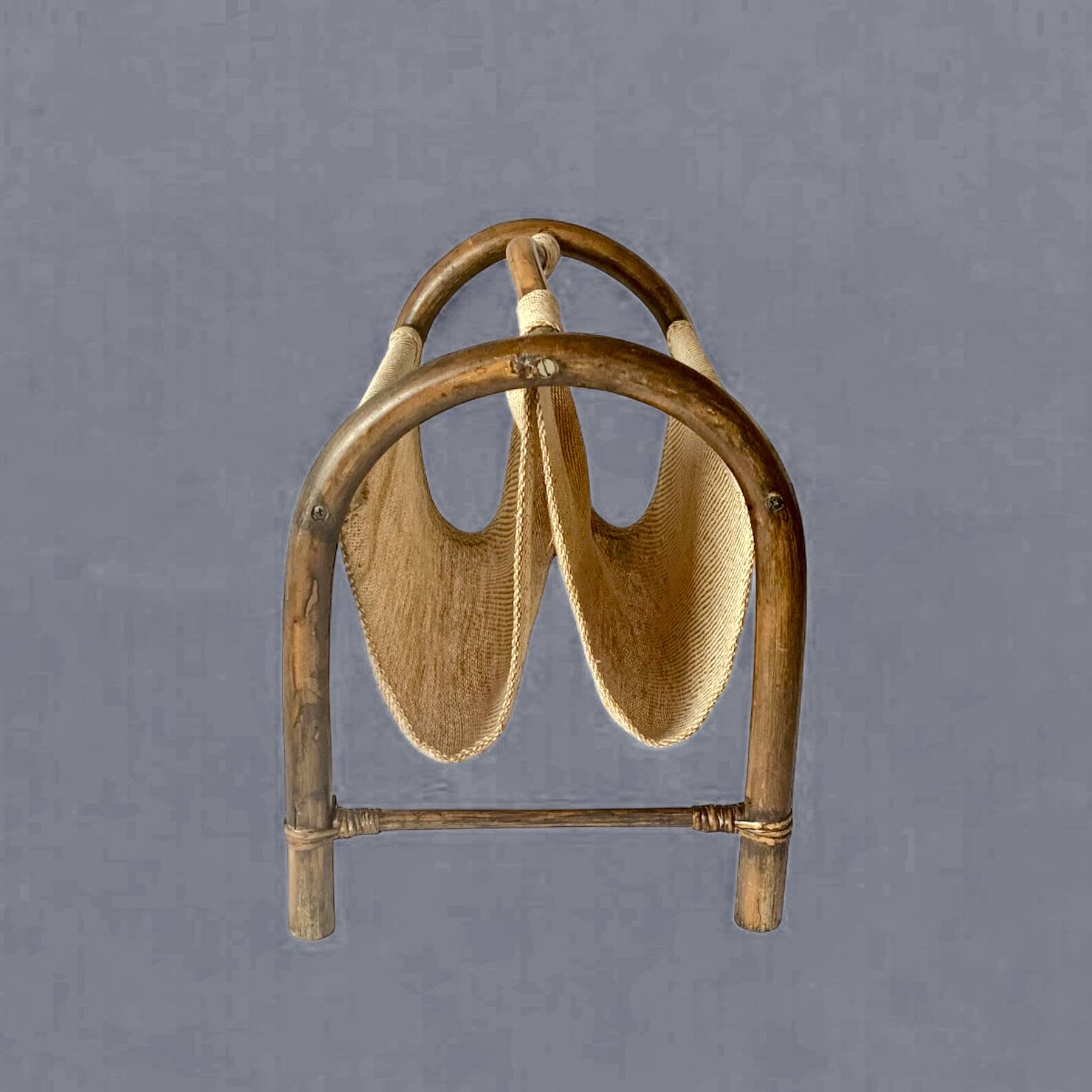 Vintage bamboo and fabric magazine rack
