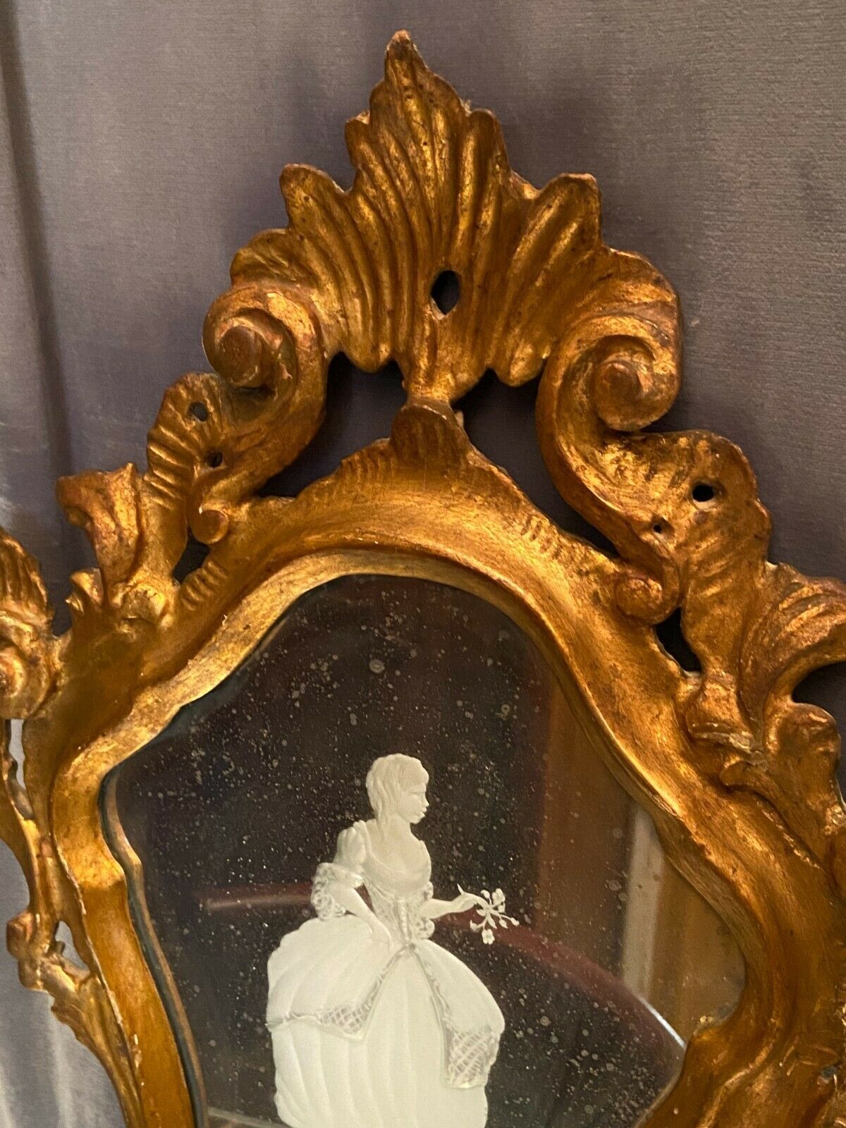 Mirror Rocaille Louis XV gilded wood decorated with a candle display depicting a lady Venice xixth