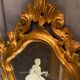 Mirror Rocaille Louis XV gilded wood decorated with a candle display depicting a lady Venice xixth