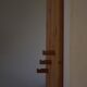 Sculptural wall-mounted coat rack in solid pine, Danish modern, 1980s.