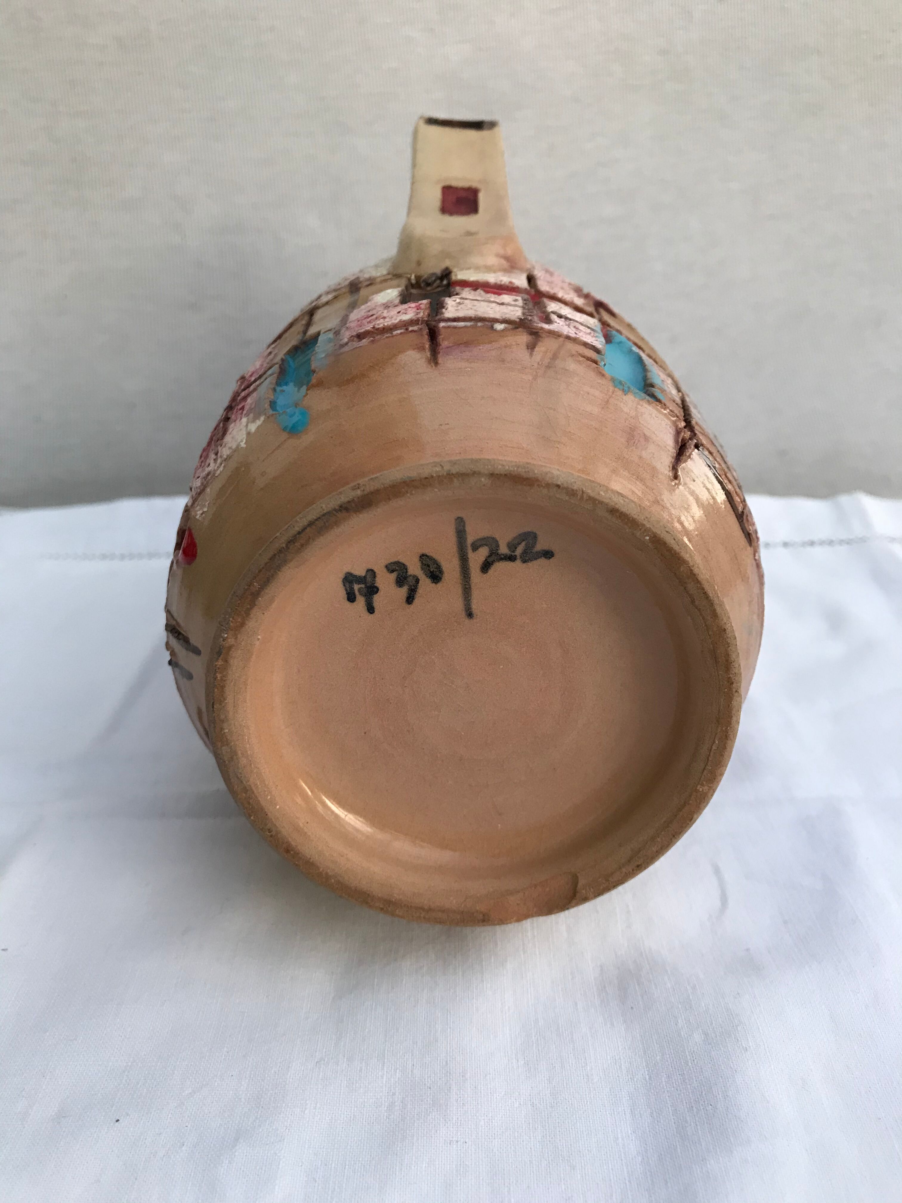 Former beige ceramic pitcher