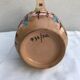 Former beige ceramic pitcher
