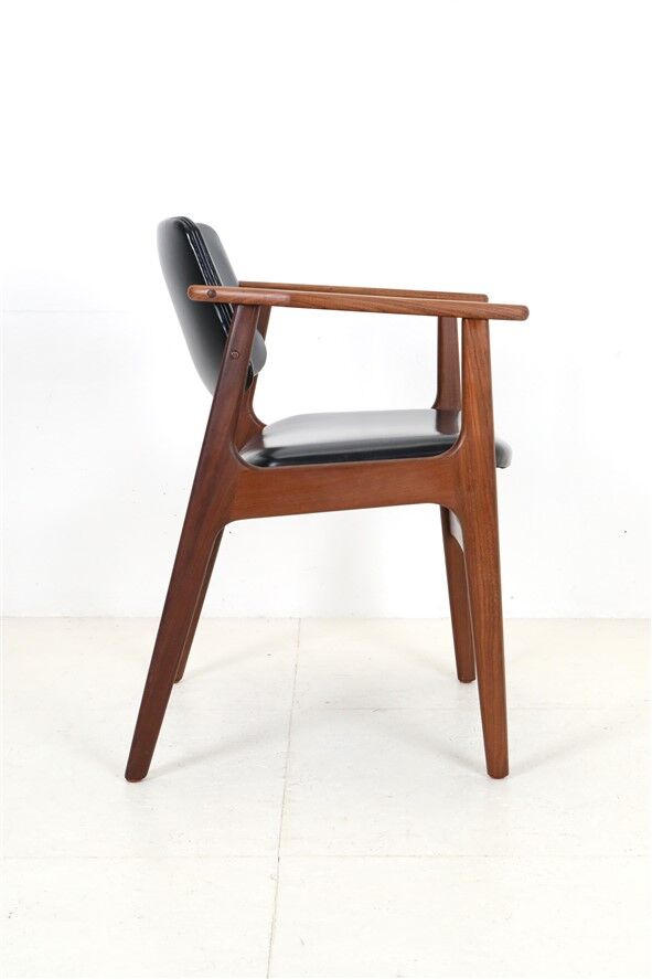 Mid Century Danish Modern teak armchair in the style of Arne Vodder