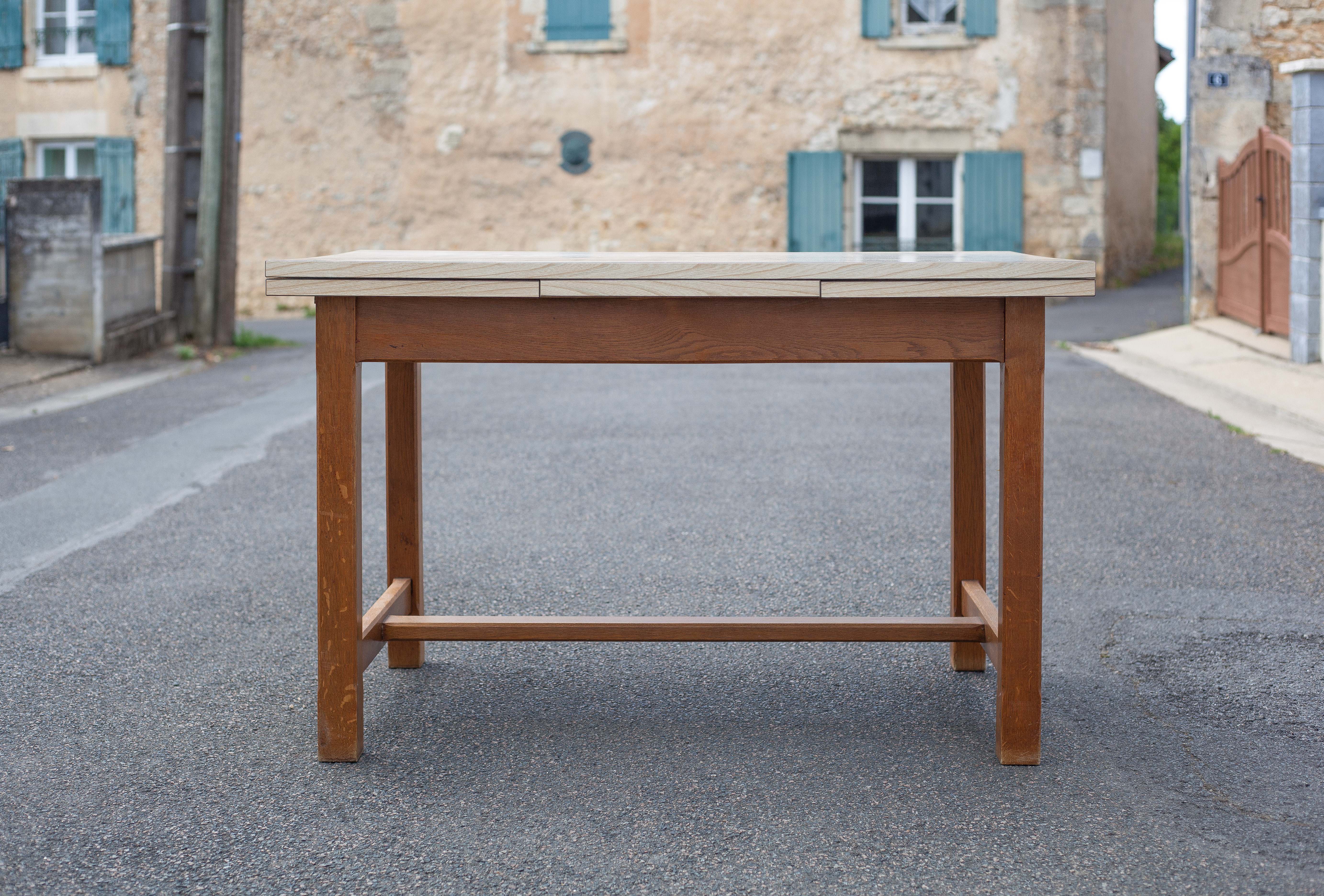 Wood and formica table with extensions