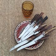 Série de 9  couteaux à fromage