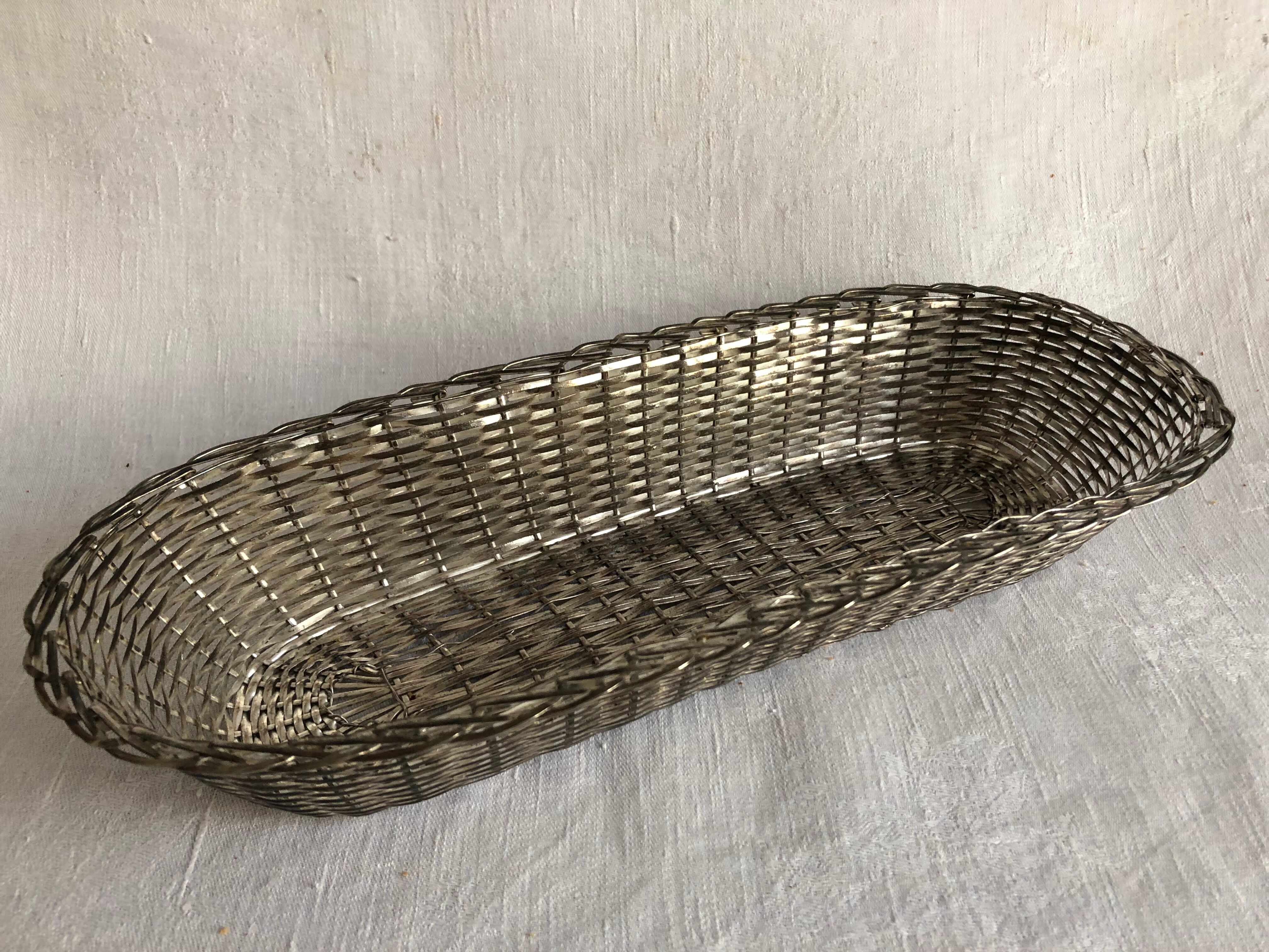 Braided silver metal bread basket