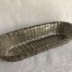 Braided silver metal bread basket