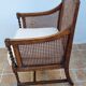 Vintage armchair in turned wood and caning, upholstered seat, 1940s.