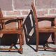 Pair of oak armchairs with straw seats and backs.