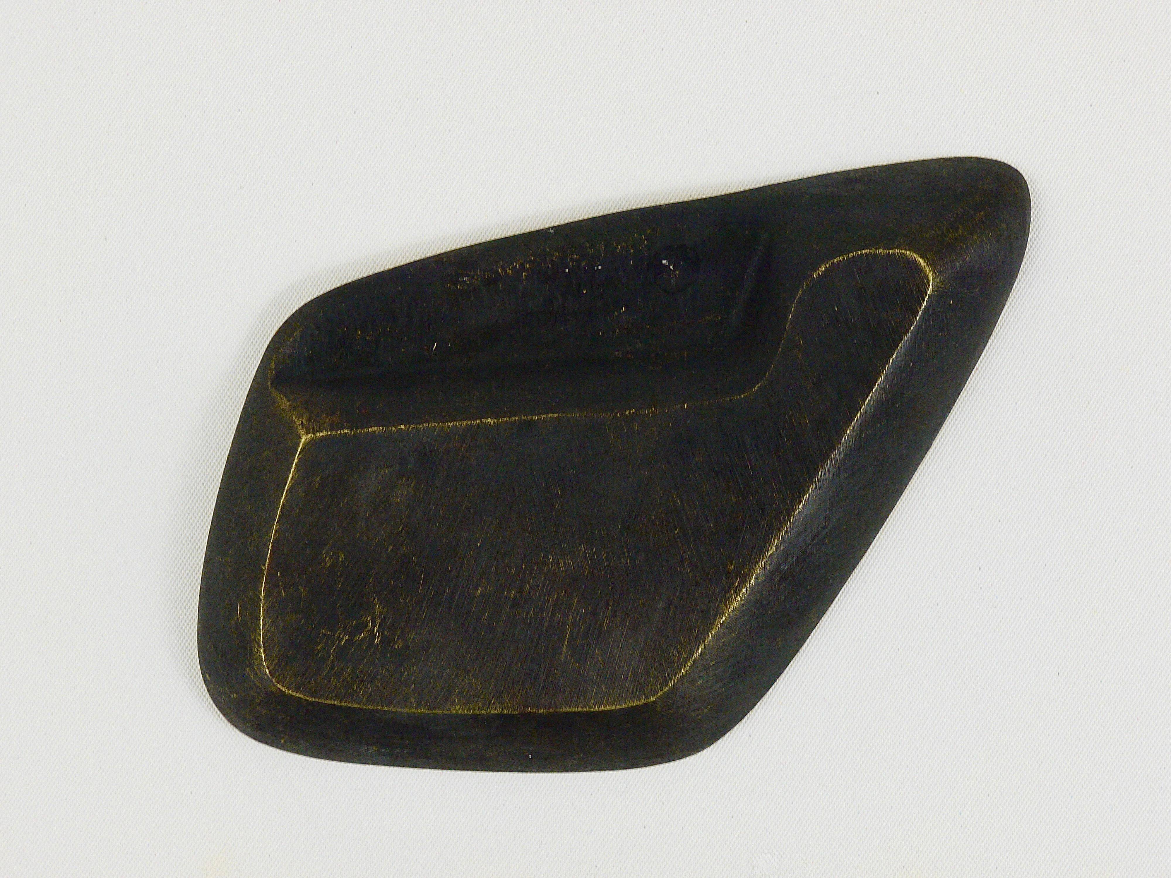 Asymmetrical modernist ashtray by Walter Bosse in black brass by Herta Baller, 1950s.