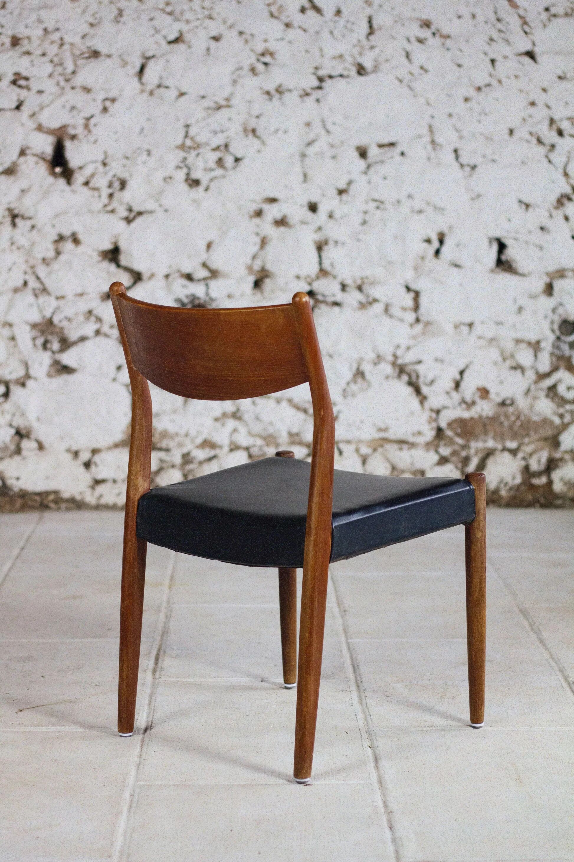 4 Scandinavian Fristho Franeker chairs in teak and faux leather, 1960.