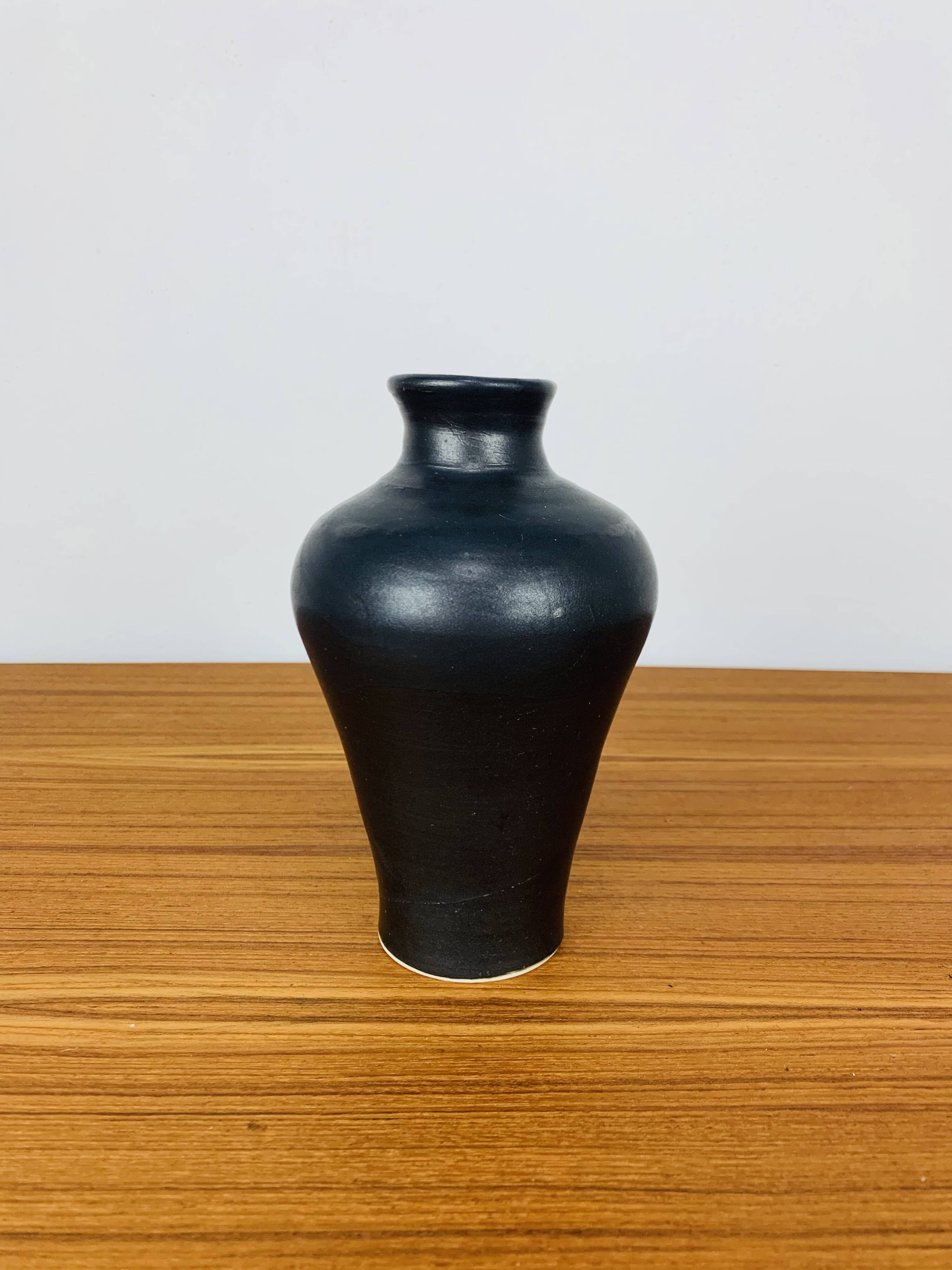Vintage black ceramic vase