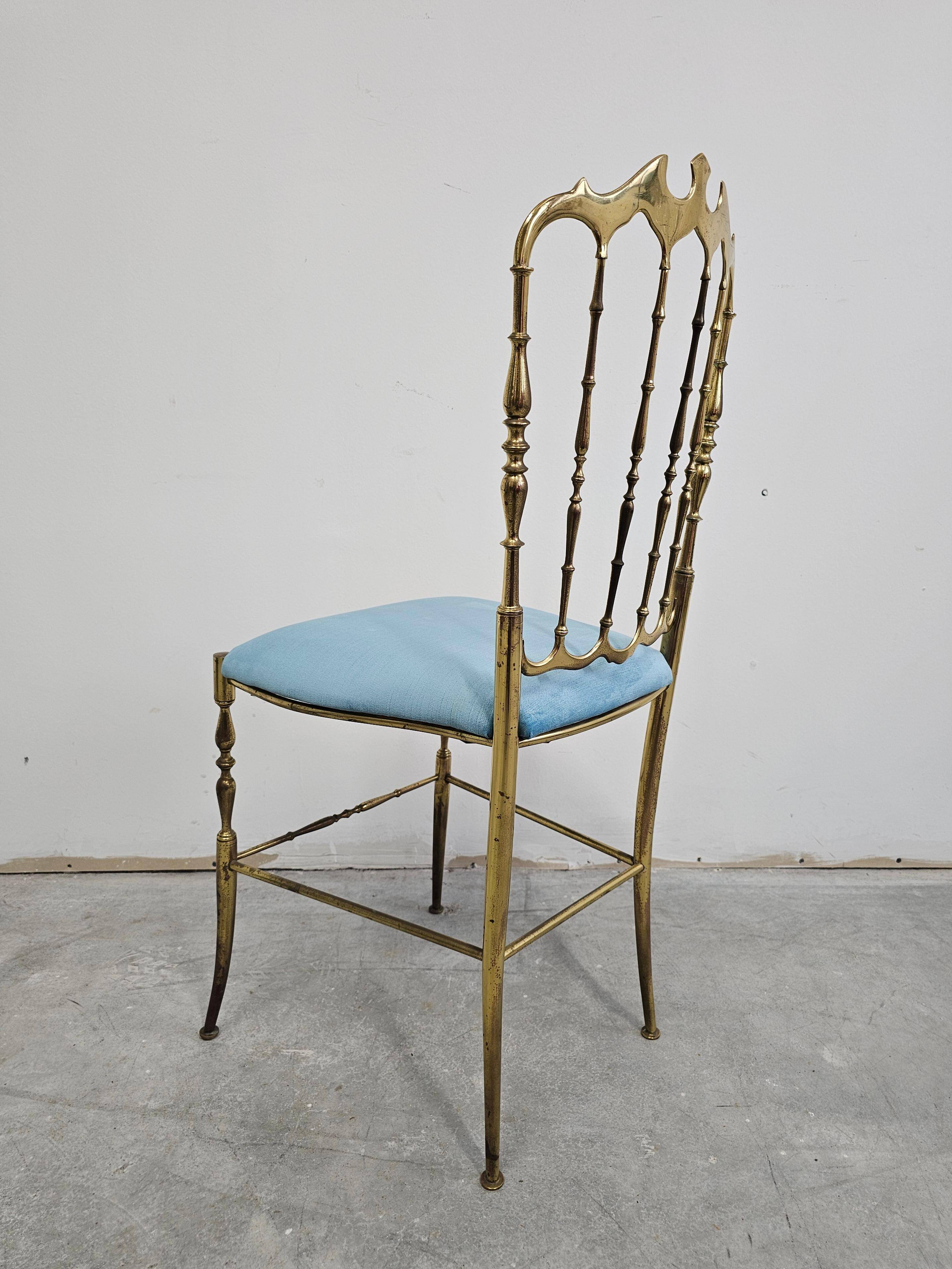 Mid-century Chiavari accent chair in solid brass with a plush seat.