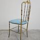 Mid-century Chiavari accent chair in solid brass with a plush seat.