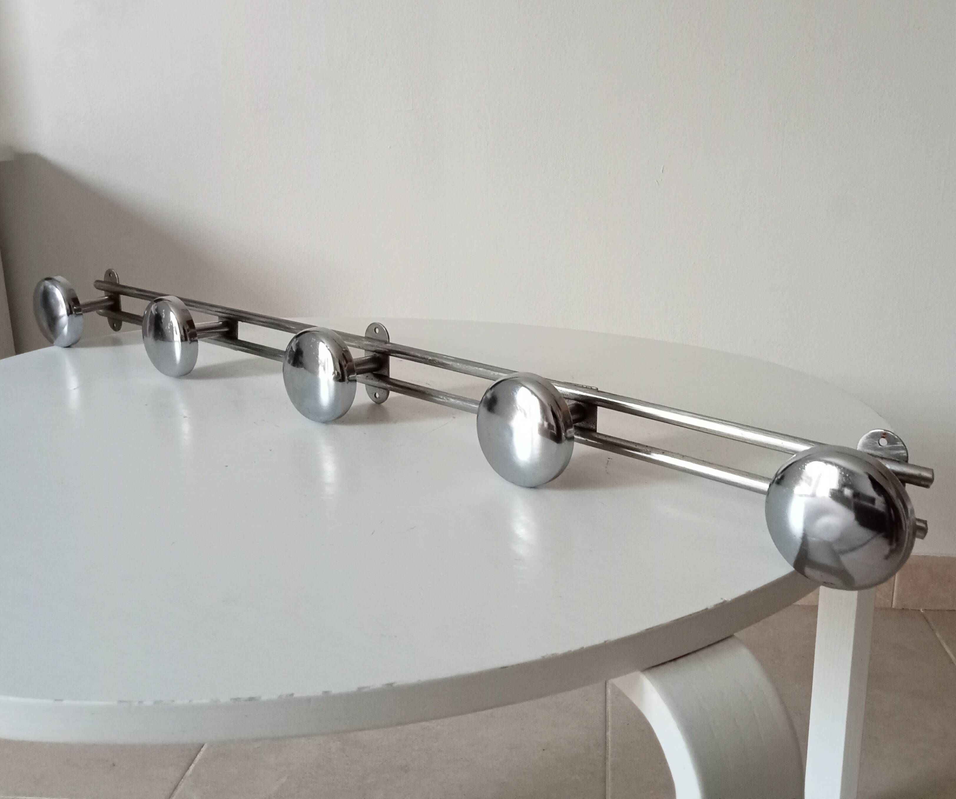 Vintage chrome wall-mounted coat rack from the 1970s