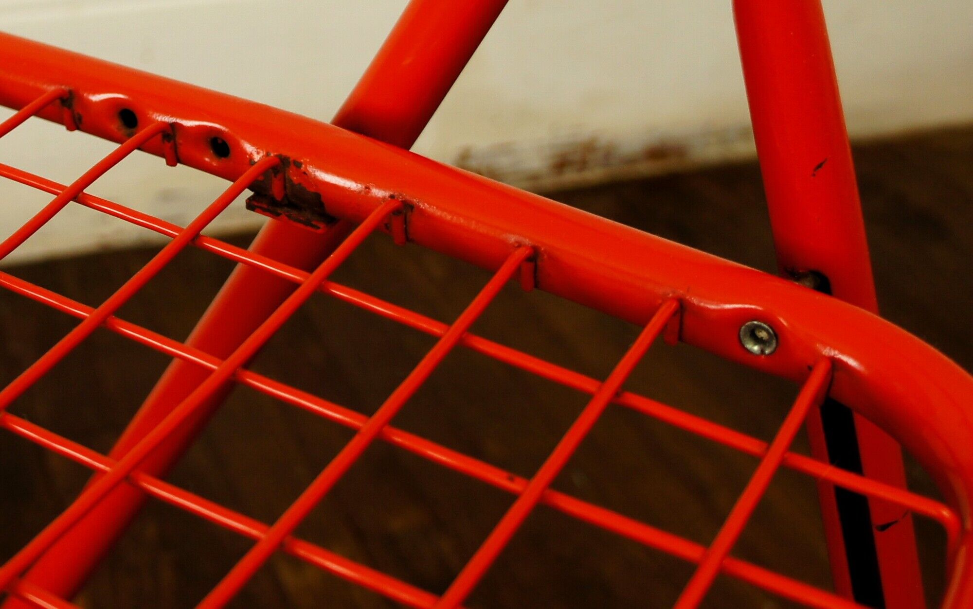 Red "grid" metal folding chair 1980