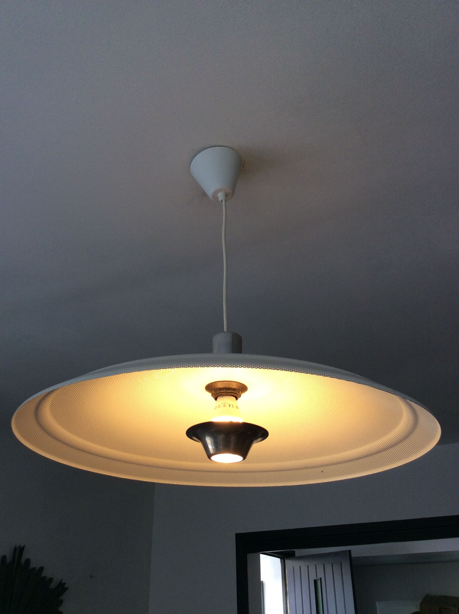 Suspension of the 70s in perforated metal