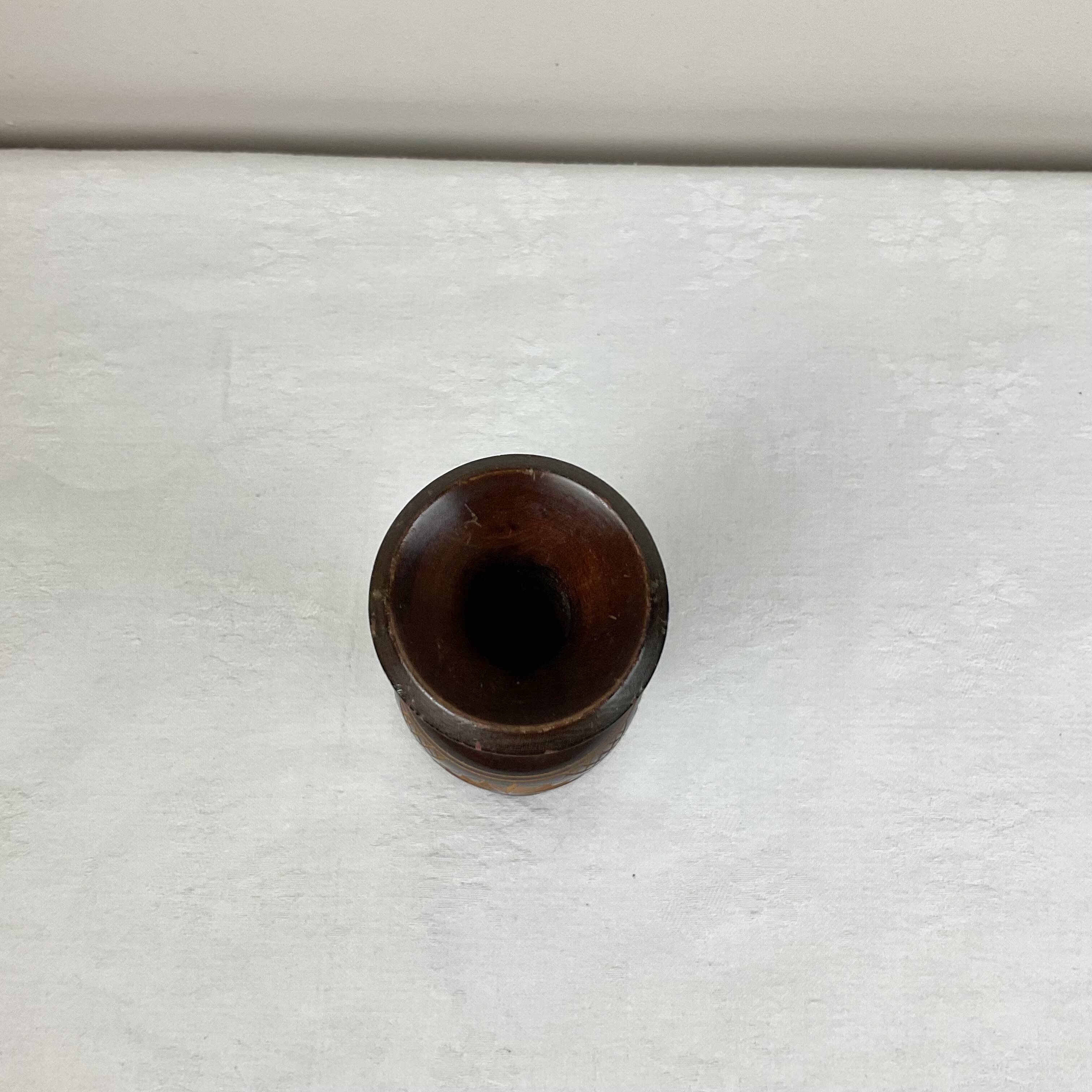 Carved wooden vase