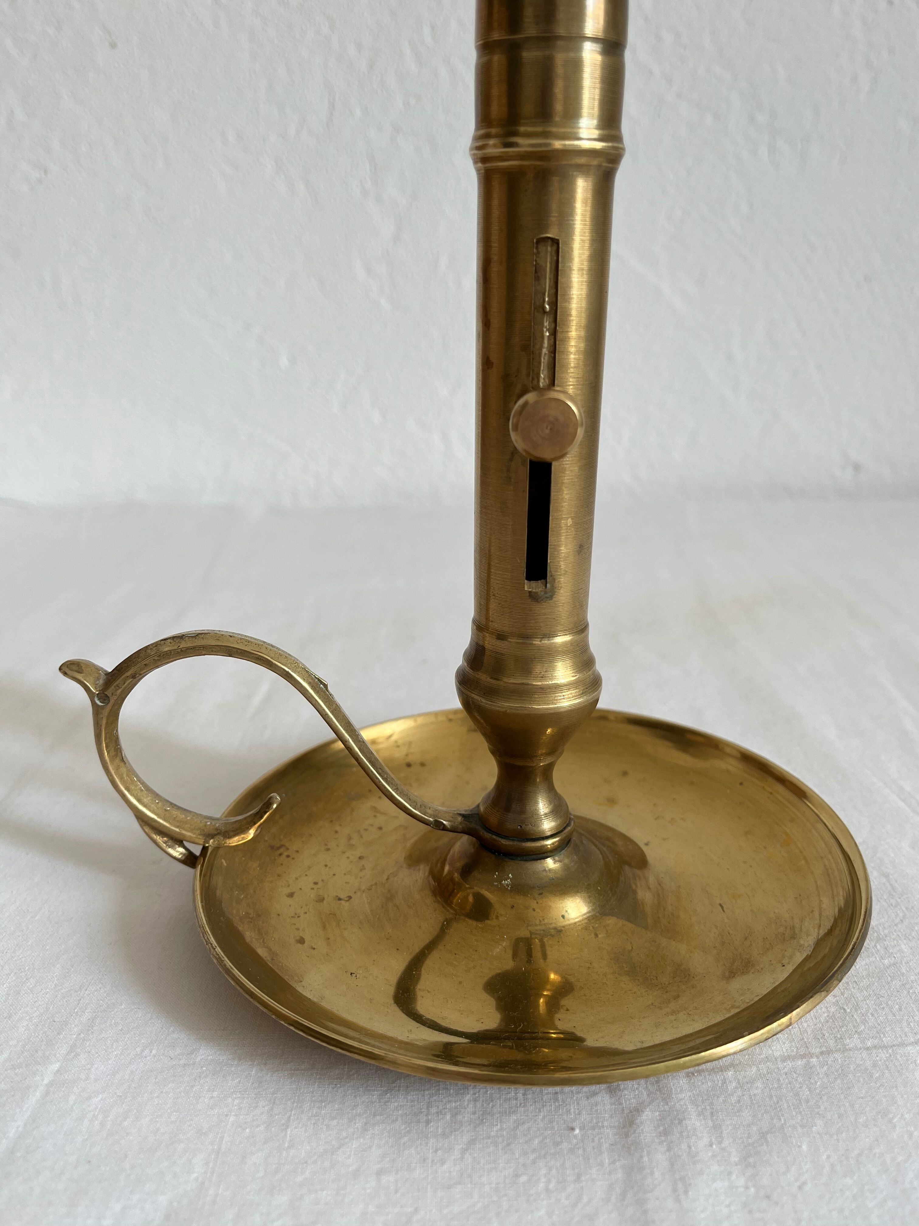 Vintage brass high hand candle holder