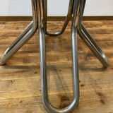 Round table in chrome and smoked glass
