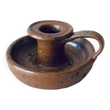 Signed sandstone candle holder