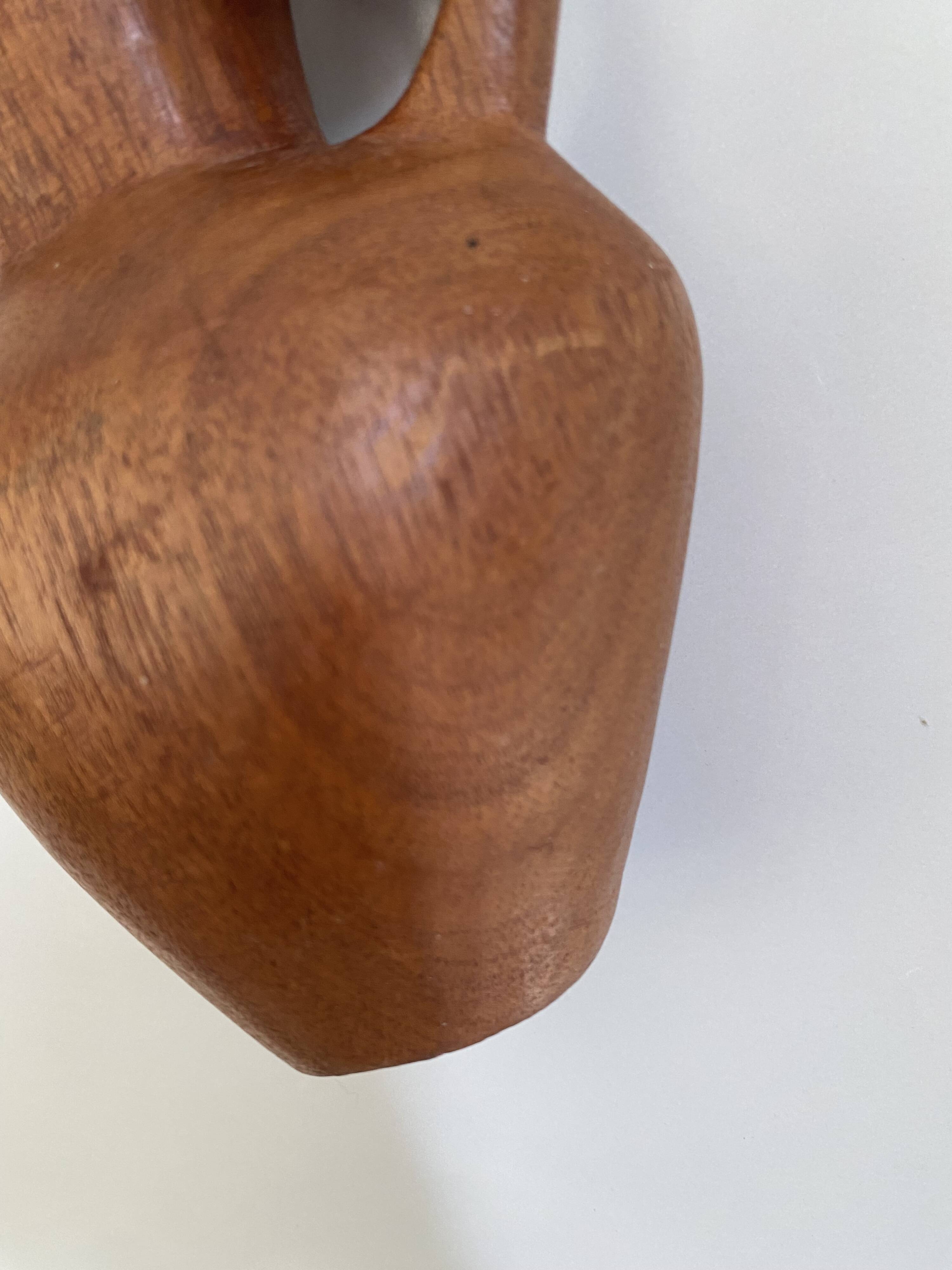 Vase and wooden chain to hang