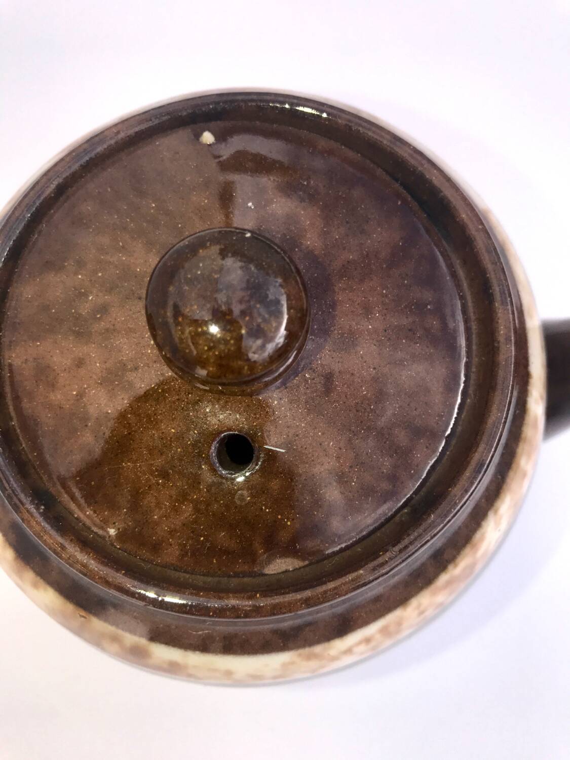 A brown England teapot