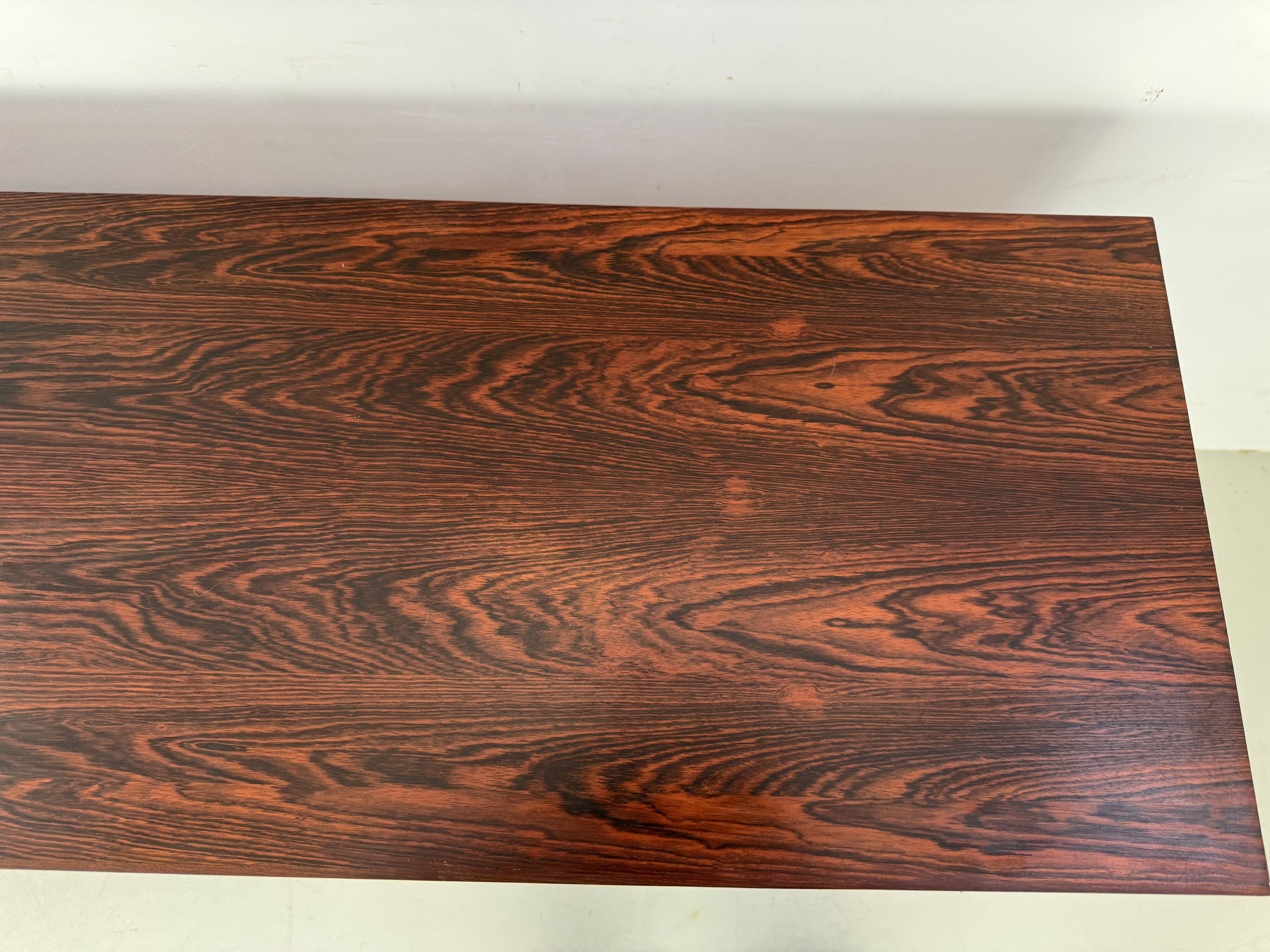 Danish rosewood vintage sideboard with sliding teak doors from the 1960s