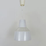 Vintage industrial suspension in glass and metal rod, factory, workshop, garage. Year 50