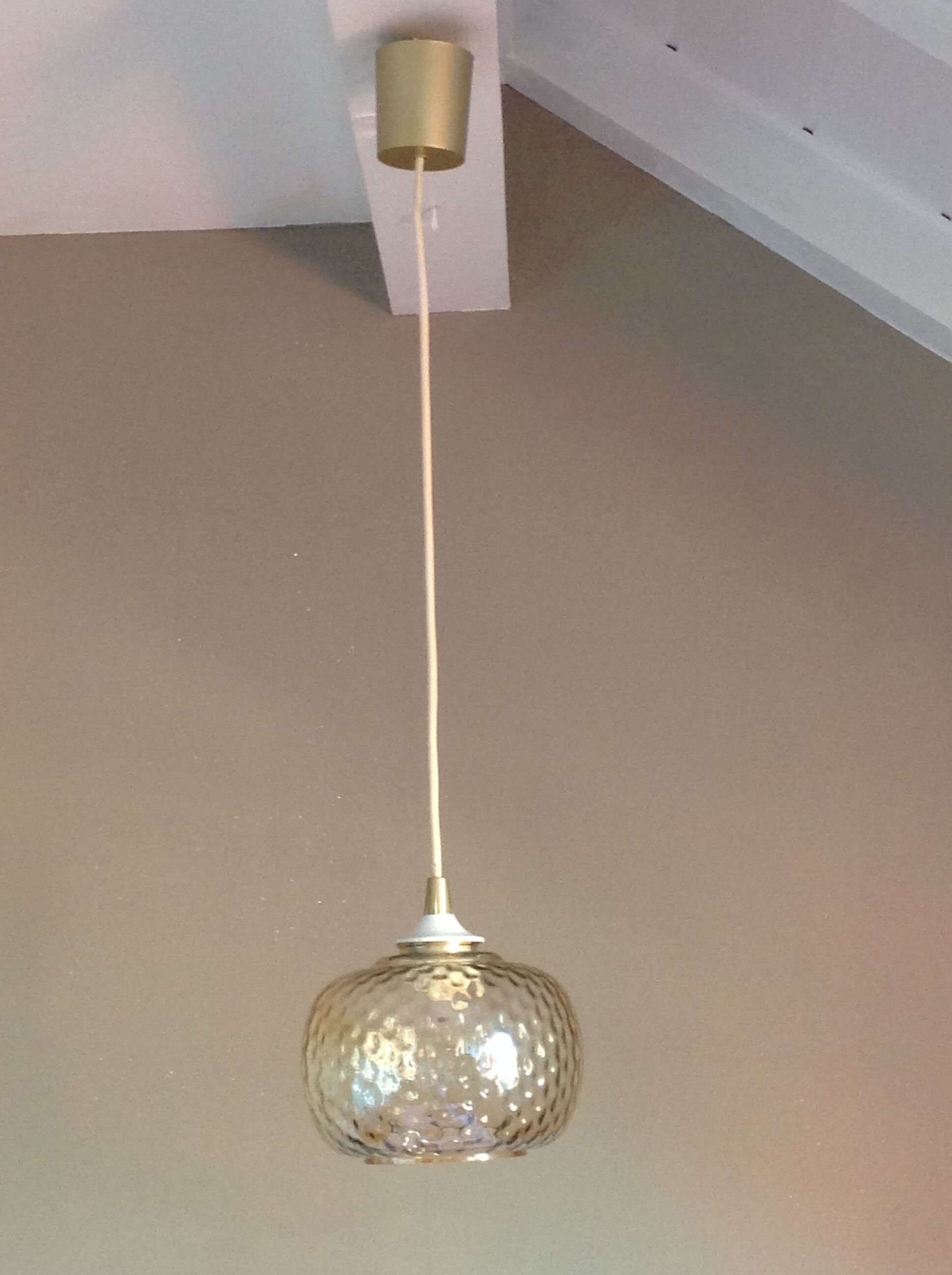 Globe pendant lamp in bubbled amber glass / vintage 60s-70s