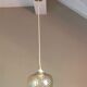 Globe pendant lamp in bubbled amber glass / vintage 60s-70s