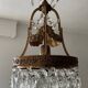 Old bronze basket chandelier with tassels